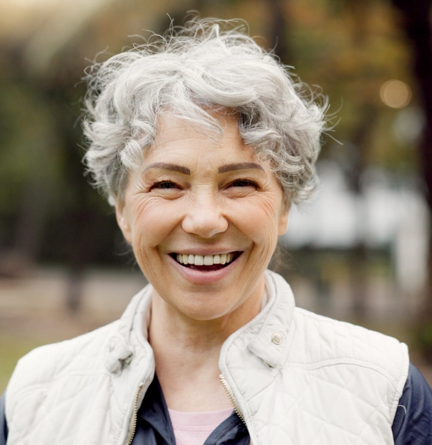 Custom dentures restoring a complete, natural-looking smile.
