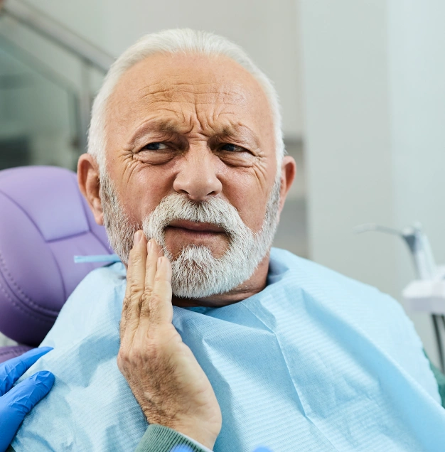 Dentist performing a safe and comfortable tooth extraction.
